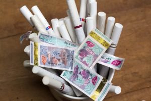 uang perokok dirampas